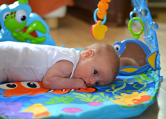 tummy time on fisher price play mat